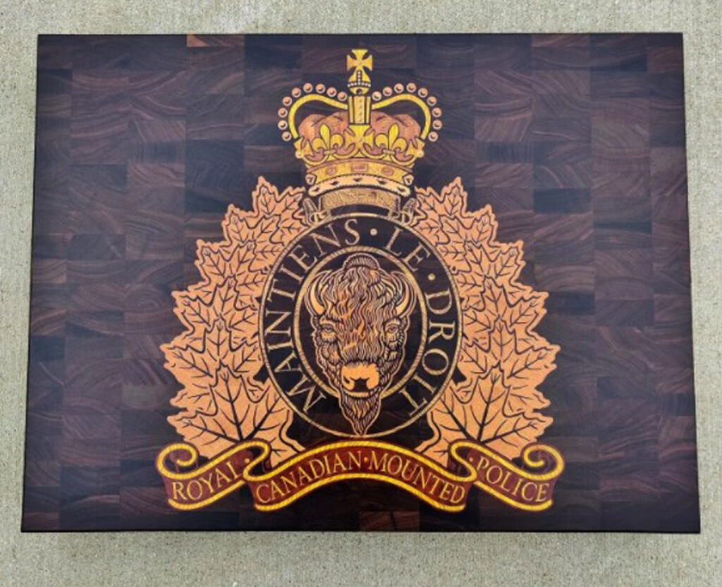 Guardians of the North: Royal Canadian Mounted Police Crest Wooden Board