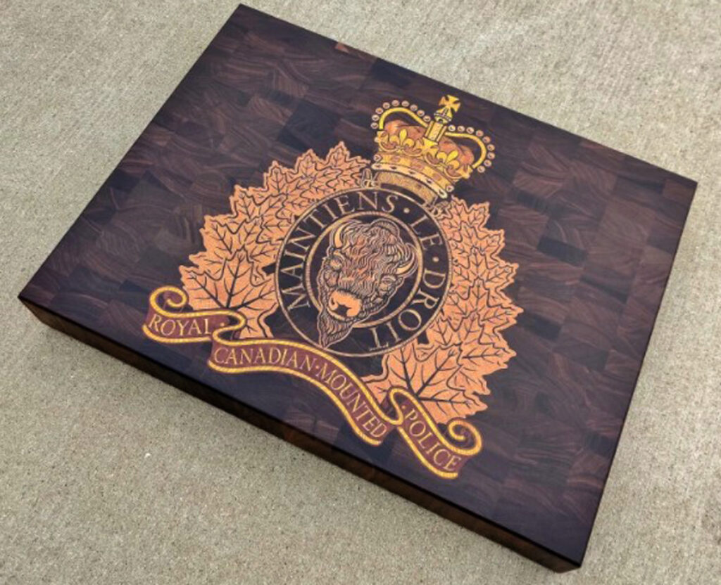 Guardians of the North: Royal Canadian Mounted Police Crest Wooden Board