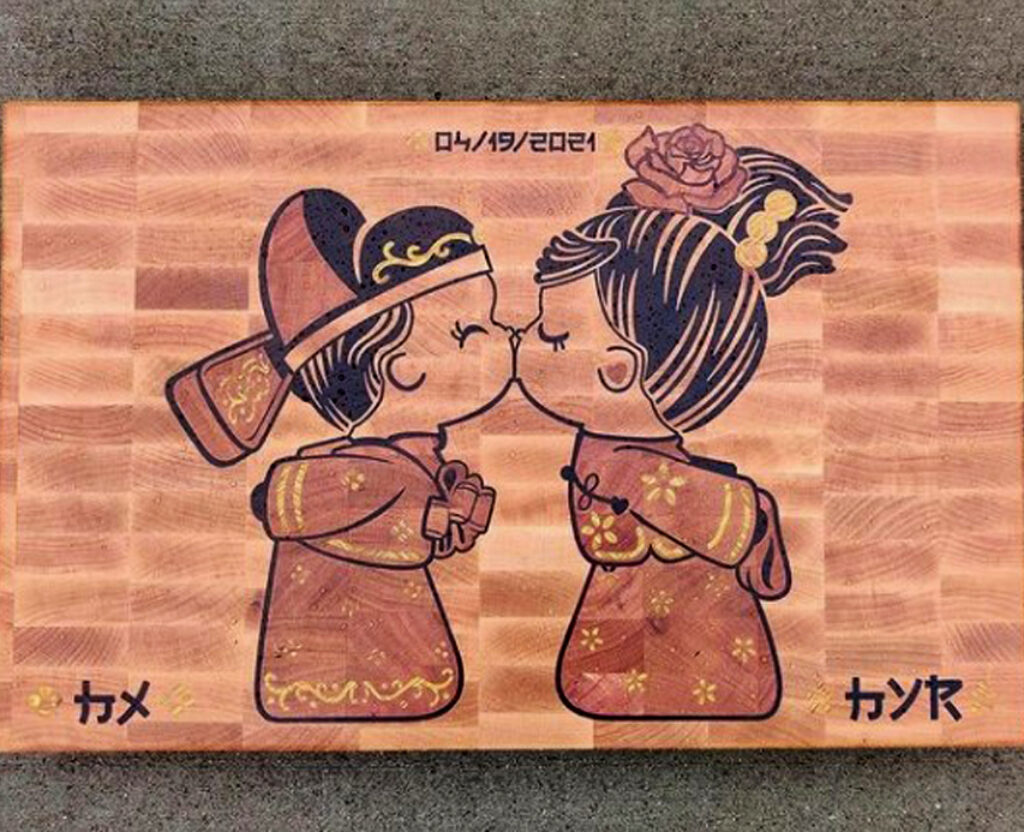 Whispers of Love: Chinese Dolls Kiss Wooden Board